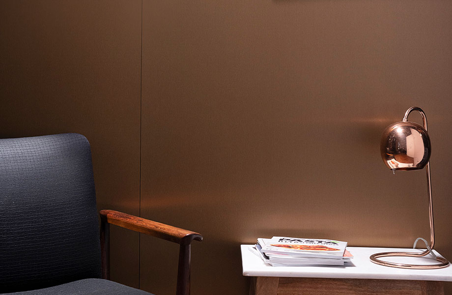 M9410 Brushed Coin lobby wall with chair and side table